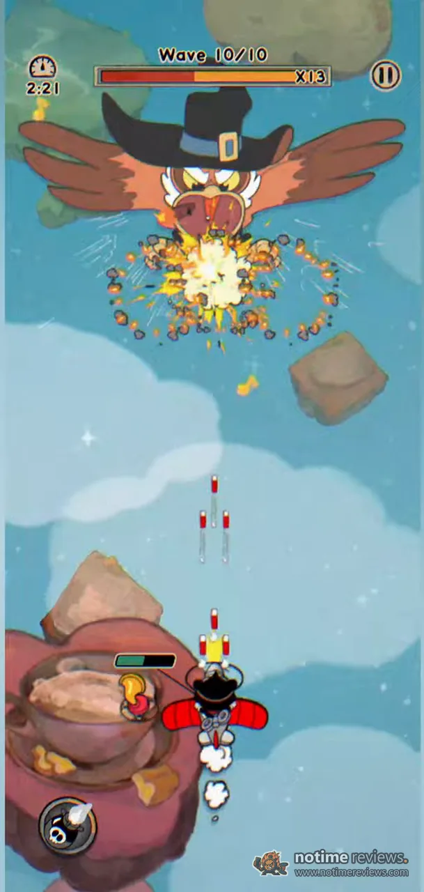 AceCraft: Sky Hero: an owl boss in a witch hat explodes above the clouds while the player's red plane fires from below